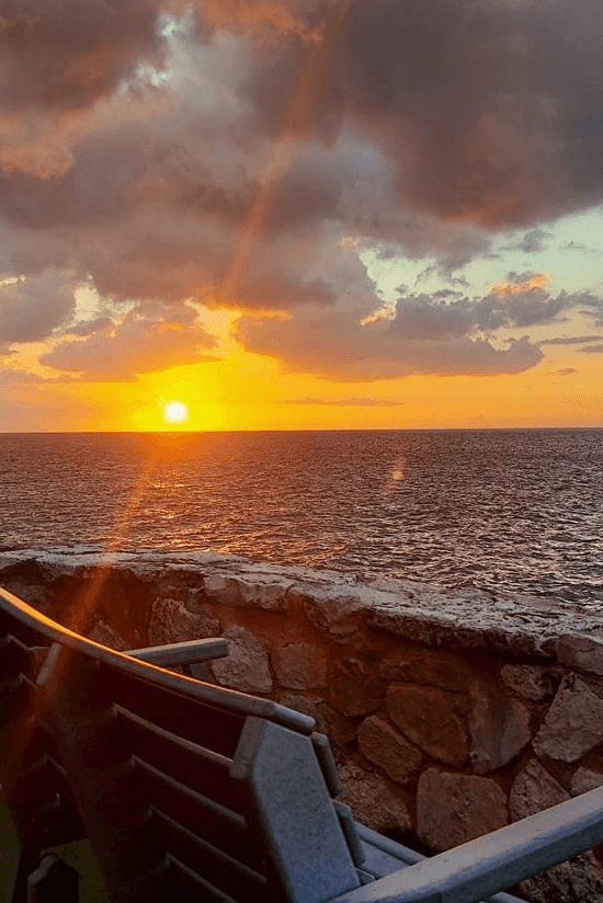 Cliffside seating overlooking the Caribbean Sea at Home Sweet Home Resort